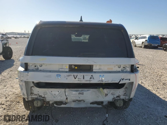 2023 Rivian R1S Adventure with VIN 7PDSGBBA4PN022157, listed as a Copart auction lot 81359984 with 13,522 mi miles and Salvage Title. Bid and sale history available at DreamBid. Image 6.