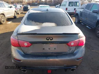 2015 Infiniti Q50 Premium z VIN JN1BV7AR2FM423666, wystawiony jako IAAI lot #41345228 z przebiegiem 67 027 mil mil oraz . Historia ofert i sprzedaży dostępna na DreamBid. Obrazek 16.