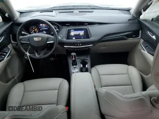 2023 Cadillac XT4 FWD Premium Luxury with VIN 1GYFZCR48PF100078, listed as a Copart auction lot 55955865 with 23,509 mi miles and Salvage title. Bid and sale history available at DreamBid. Image 8.