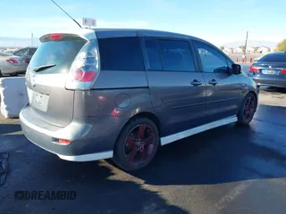 2007 Mazda 5 Touring with VIN JM1CR293770137040, listed as a IAAI auction lot 41251751 with 233,035 mi miles and . Bid and sale history available at DreamBid. Image 4.