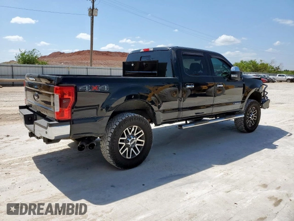 2017 Ford F-250 Lariat with VIN 1FT7W2BT2HEB92374, listed as a Copart auction lot 59897975 with 310,479 mi miles and Salvage title. Bid and sale history available at DreamBid. Image 3.