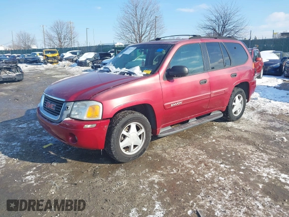 2003 GMC Envoy SLE with VIN 1GKDT13S732131869, listed as a IAAI auction lot 41422135 with 163,193 mi miles. Bid and sale history available at carsss.com. Image 2.