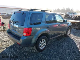 2010 Mazda Tribute Touring with VIN 4F2CY9C73AKM04595, listed as a IAAI auction lot 40797681 with 122,774 mi miles. Bid and sale history available at carsss.com. Image 4.