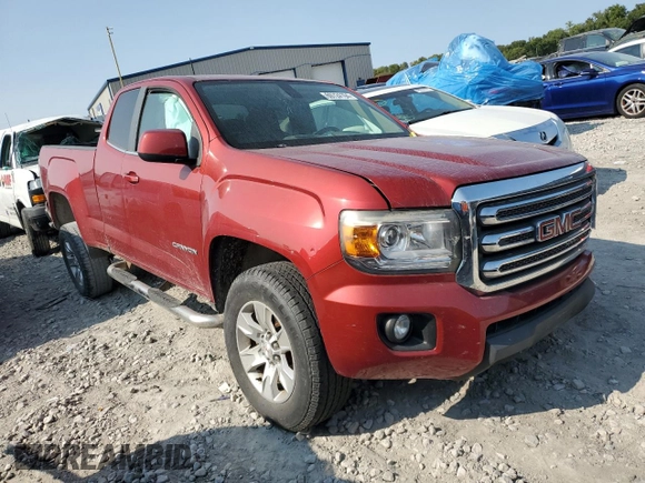 2015 GMC Canyon 2WD SLE with VIN 1GTH5BEA0F1190810, listed as a Copart auction lot 69724194 with 238,397 mi miles and Salvage Title. Bid and sale history available at carsss.com. Image 4.