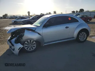 2013 Volkswagen Beetle Entry with VIN 3VWFP7AT9DM668645, listed as a Copart auction lot 49601375 with 145,293 mi miles and Salvage Title. Bid and sale history available at DreamBid. Image 1.