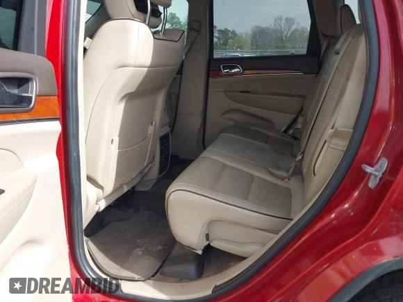 2011 Jeep Grand Cherokee Overland with VIN 1J4RS6GT4BC561169, listed as a IAAI auction lot 41847912 with 220,713 mi miles and . Bid and sale history available at DreamBid. Image 8.