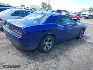 2016 Dodge Challenger SXT Plus with VIN 2C3CDZAG8GH209546, listed as a IAAI auction lot 42007800 with 162,034 mi miles. Bid and sale history available at carsss.com. Image 4.