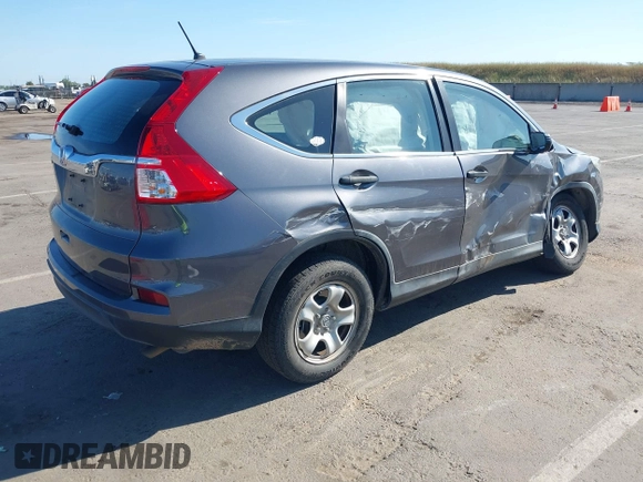 2015 Honda CR-V LX with VIN 3CZRM3H31FG709059, listed as a IAAI auction lot 42131551 with 98,738 mi miles and . Bid and sale history available at carsss.com. Image 4.
