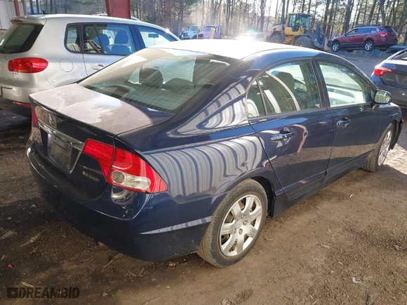 2009 Honda Civic Sdn LX with VIN 2HGFA16559H544472, listed as a IAAI auction lot 41695513 with 124,845 mi miles. Bid and sale history available at carsss.com. Image 4.