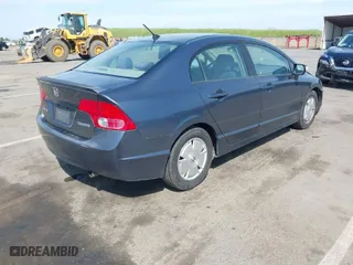 2008 Honda Civic Hybrid with VIN JHMFA36258S031535, listed as a IAAI auction lot 41888669 with 257,739 mi miles. Bid and sale history available at carsss.com. Image 4.