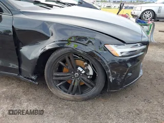 2024 Volvo S60 Plus Black Edition with VIN 7JRL12FH7RG300837, listed as a IAAI auction lot 42419110 with 9,765 mi miles and . Bid and sale history available at DreamBid. Image 6.