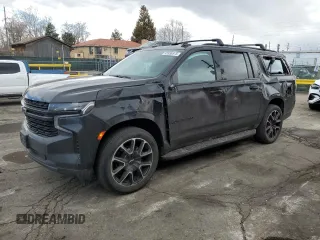 2024 Chevrolet Suburban RST with VIN 1GNSKEKD0RR192732, listed as a Copart auction lot 45990975 with 50,883 mi miles and Salvage title. Bid and sale history available at DreamBid. Image 1.