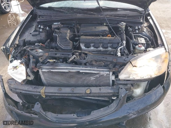 2003 Honda Civic EX with VIN 1HGEM22973L024883, listed as a IAAI auction lot 41536461 with 219,927 mi miles. Bid and sale history available at carsss.com. Image 10.