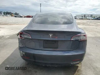 2023 Tesla Model 3 с VIN 5YJ3E1EA7PF449077, выставлен на аукционе Copart как лот 56821975 с пробегом 42 037 миль миль и Списание • Salvage title. История ставок и продаж доступна на DreamBid. Изображение 6.