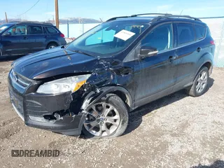 2013 Ford Escape SEL with VIN 1FMCU9H93DUB56102, listed as a IAAI auction lot 41809309 with 60,498 mi miles. Bid and sale history available at carsss.com. Image 2.
