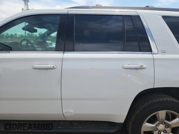 2020 Chevrolet Tahoe LT z VIN 1GNSKBKC7LR301863, wystawiony jako Copart lot #65205365 z przebiegiem 78 866 mil mil oraz Szkoda całkowita • Salvage title. Historia ofert i sprzedaży dostępna na DreamBid. Obrazek 13.