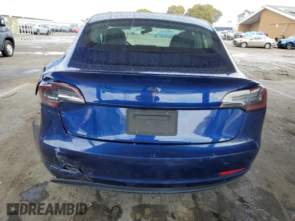 2020 Tesla Model 3 Standard Range Plus with VIN 5YJ3E1EA1LF631139, listed as a Copart auction lot 49161805 with 58,140 mi miles and Salvage Title. Bid and sale history available at DreamBid. Image 6.
