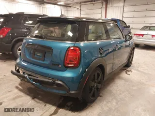 2024 MINI Hardtop 2 Door Cooper S with VIN WMW53DH08R2U74513, listed as a IAAI auction lot 40993803 with 7,817 mi miles. Bid and sale history available at carsss.com. Image 4.