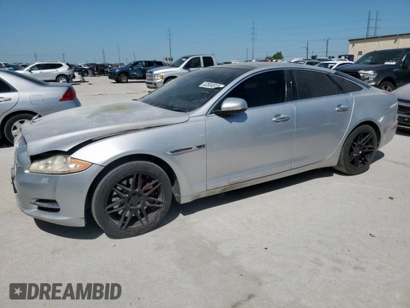 2012 Jaguar XJ with VIN SAJWA1CB0CLV23002, listed as a Copart auction lot 52804915 with 149,331 mi miles and Salvage title. Bid and sale history available at DreamBid. Image 1.