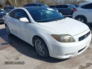 2008 Scion tC Spec with VIN JTKDE167680265135, listed as a IAAI auction lot 41719878 with 254,059 mi miles. Bid and sale history available at carsss.com. Image 1.