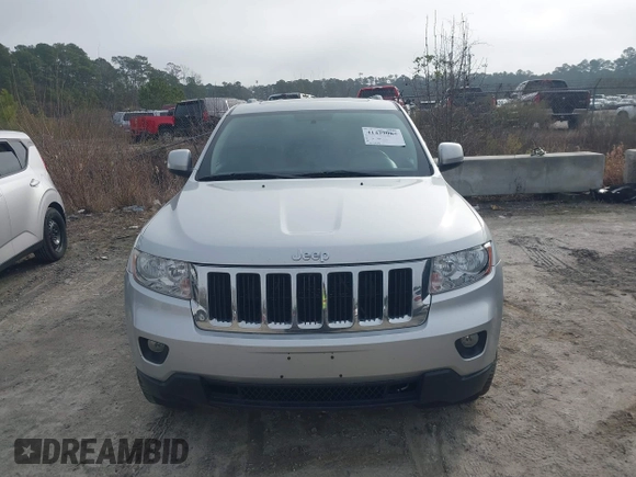 2012 Jeep Grand Cherokee Laredo with VIN 1C4RJFAG7CC189381, listed as a IAAI auction lot 41429085 with 137,238 mi miles. Bid and sale history available at carsss.com. Image 11.