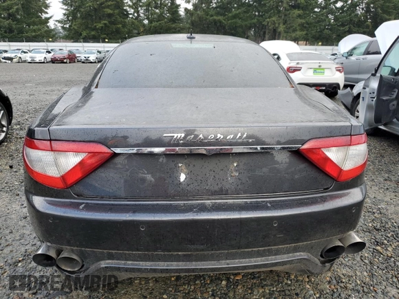 2011 Maserati GranTurismo with VIN ZAM45GLA7B0059139, listed as a Copart auction lot 82046824 with 56,241 mi miles and Clean title. Bid and sale history available at DreamBid. Image 6.