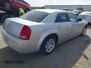 2006 Chrysler 300 Touring with VIN 2C3KA53G26H459048, listed as a IAAI auction lot 42049103 with 256,564 mi miles. Bid and sale history available at carsss.com. Image 4.