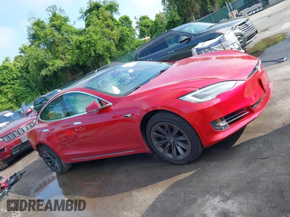 2020 Tesla Model S Long Range with VIN 5YJSA1E25LF396213, listed as a IAAI auction lot 42383231 with 73,125 mi miles and . Bid and sale history available at DreamBid. Image 13.
