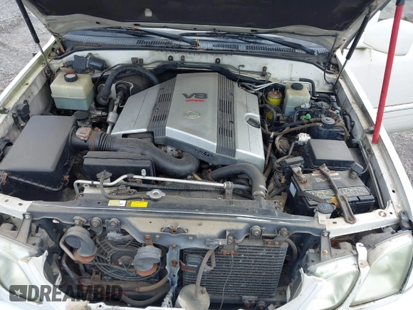 2001 Lexus LX 470 z VIN JTJHT00W613506010, wystawiony jako IAAI lot #42277268 z przebiegiem 186 671 mil mil oraz . Historia ofert i sprzedaży dostępna na DreamBid. Obrazek 10.