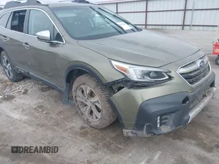 2021 Subaru Outback Touring z VIN 4S4BTAPC4M3147931, wystawiony jako IAAI lot #42013689 z przebiegiem 89 000 mil mil oraz . Historia ofert i sprzedaży dostępna na DreamBid. Obrazek 1.