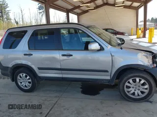 2005 Honda CR-V EX with VIN SHSRD788X5U323021, listed as a IAAI auction lot 42034641 with 154,206 mi miles. Bid and sale history available at carsss.com. Image 13.