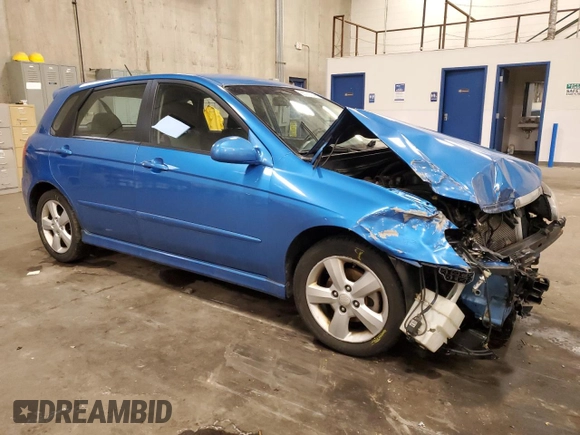 2007 Kia Spectra with VIN KNAFE161775007569, listed as a Copart auction lot 86778784 with 125,463 mi miles and Salvage Title. Bid and sale history available at carsss.com. Image 4.