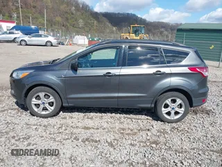 2016 Ford Escape SE with VIN 1FMCU9GX5GUA06660, listed as a IAAI auction lot 42043031 with 87,719 mi miles. Bid and sale history available at carsss.com. Image 14.