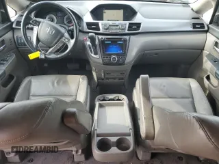 2014 Honda Odyssey Touring z VIN 5FNRL5H94EB006827, wystawiony jako Copart lot #55859715 z przebiegiem 195 131 mil mil oraz Szkoda całkowita • Salvage title. Historia ofert i sprzedaży dostępna na DreamBid. Obrazek 8.