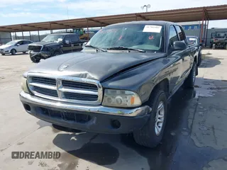 2001 Dodge Dakota z VIN 1B7HL2AX51S333575, wystawiony jako IAAI lot #41782582 z przebiegiem 291 640 mil mil oraz . Historia ofert i sprzedaży dostępna na DreamBid. Obrazek 6.