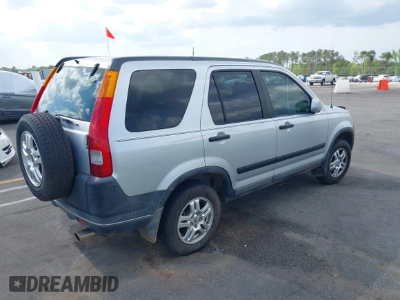 2004 Honda CR-V EX with VIN SHSRD78824U215572, listed as a IAAI auction lot 41932932 with 197,003 mi miles and . Bid and sale history available at carsss.com. Image 4.