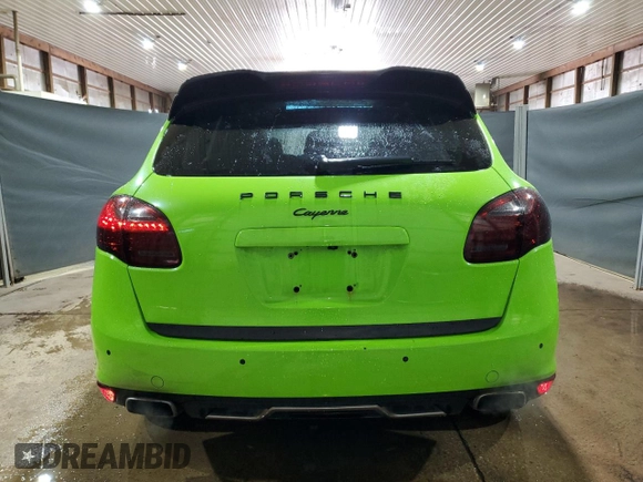 2012 Porsche Cayenne z VIN WP1AA2A28CLA05588, wystawiony jako Copart lot #54973895 z przebiegiem 189 838 mil mil oraz Czysty tytuł • Clean title. Historia ofert i sprzedaży dostępna na DreamBid. Obrazek 6.