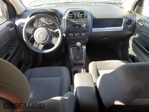 2016 Jeep Compass Sport with VIN 1C4NJDBB0GD753006, listed as a Copart auction lot 42496815 with 128,320 mi miles and Salvage Title. Bid and sale history available at carsss.com. Image 8.