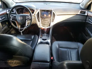 2014 Cadillac SRX Luxury Collection z VIN 3GYFNEE34ES641335, wystawiony jako Copart lot #47519325 z przebiegiem 124 407 mil mil oraz Szkoda całkowita • Salvage title. Historia ofert i sprzedaży dostępna na DreamBid. Obrazek 8.