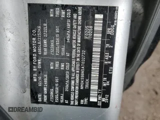 2010 Ford Transit Connect XLT z VIN NM0KS9BN5AT032732, wystawiony jako Copart lot #53851165 z przebiegiem 229 512 mil mil oraz Szkoda całkowita • Salvage title. Historia ofert i sprzedaży dostępna na DreamBid. Obrazek 13.