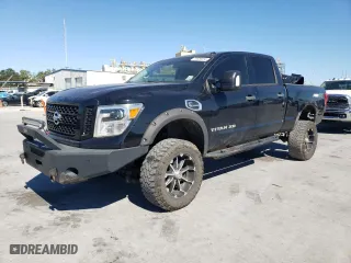 2019 Nissan Titan XD SV with VIN 1N6BA1F44KN519853, listed as a Copart auction lot 73829234 with 135,460 mi miles and Salvage Title. Bid and sale history available at carsss.com. Image 1.