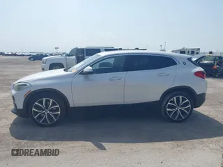 2018 BMW X2 sDrive28i z VIN WBXYJ3C39JEJ82408, wystawiony jako IAAI lot #41919498 z przebiegiem 121 403 mil mil oraz . Historia ofert i sprzedaży dostępna na DreamBid. Obrazek 14.