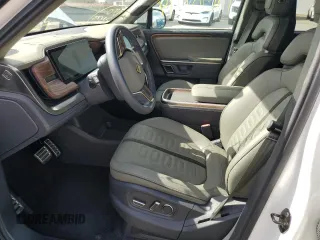 2023 Rivian R1S Adventure z VIN 7PDSGABA3PN024458, wystawiony jako Copart lot #74087714 z przebiegiem 3 505 mil mil oraz Nie do naprawy • Non repairable. Historia ofert i sprzedaży dostępna na DreamBid. Obrazek 7.