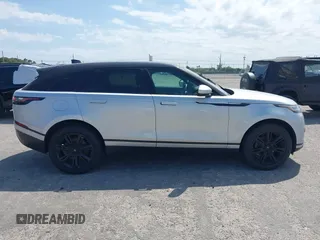 2020 Land Rover Range Rover Velar S z VIN SALYB2EXXLA255258, wystawiony jako IAAI lot #41823002 z przebiegiem 66 527 mil mil oraz . Historia ofert i sprzedaży dostępna na DreamBid. Obrazek 14.