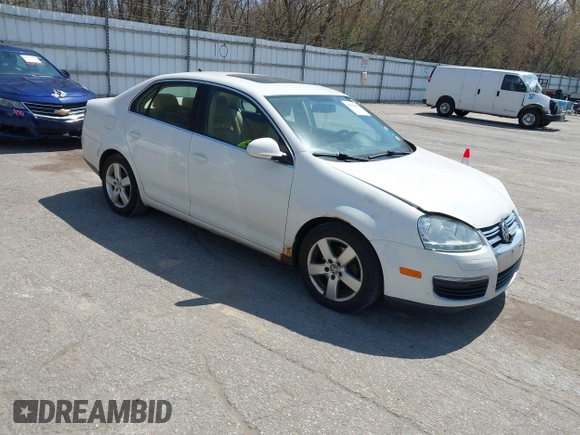 2009 Volkswagen Jetta SE z VIN 3VWRM71K99M057390, wystawiony jako IAAI lot #42094648 z przebiegiem 168 533 mil mil oraz . Historia ofert i sprzedaży dostępna na DreamBid. Obrazek 1.