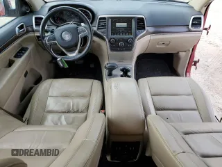 2014 Jeep Grand Cherokee Limited with VIN 1C4RJEBT7EC147432, listed as a Copart auction lot 83339654 with 145,017 mi miles and Salvage Title. Bid and sale history available at DreamBid. Image 8.