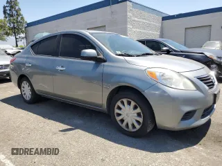 2012 Nissan Versa SV with VIN 3N1CN7AP8CL818508, listed as a Copart auction lot 63164515 with 94,455 mi miles and Salvage title. Bid and sale history available at DreamBid. Image 4.