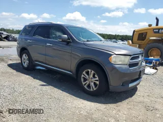 2013 Dodge Durango Crew with VIN 1C4SDJDT4DC696390, listed as a Copart auction lot 63608365 with 176,285 mi miles and Clean title. Bid and sale history available at DreamBid. Image 4.