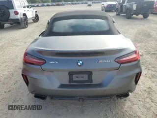 2020 BMW Z4 sDriveM40i with VIN WBAHF9C04LWW40647, listed as a Copart auction lot 77301284 with 0 mi miles and Salvage Title. Bid and sale history available at carsss.com. Image 6.