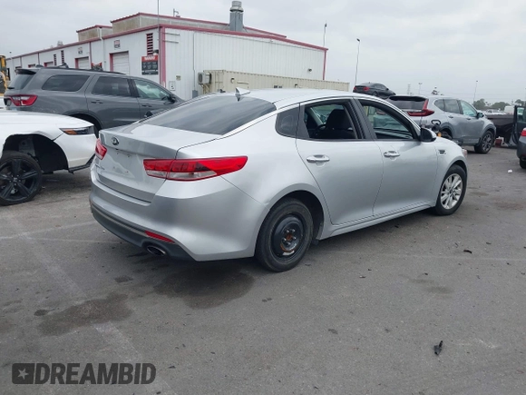 2016 Kia Optima LX with VIN 5XXGT4L34GG023812, listed as a IAAI auction lot 42034160 with 96,720 mi miles and . Bid and sale history available at DreamBid. Image 4.